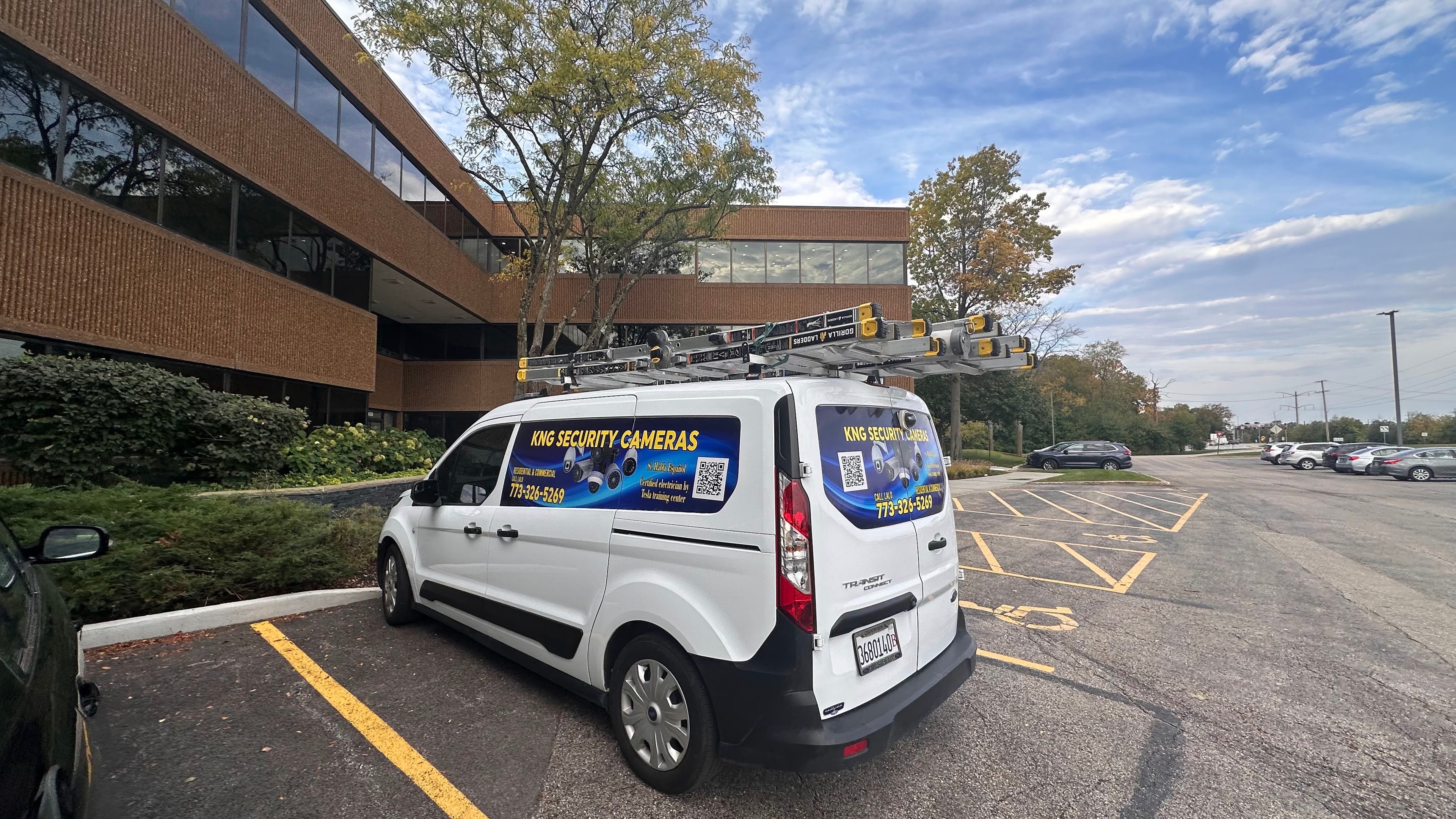 KNG Security Cameras van at a residential job site in Chicago